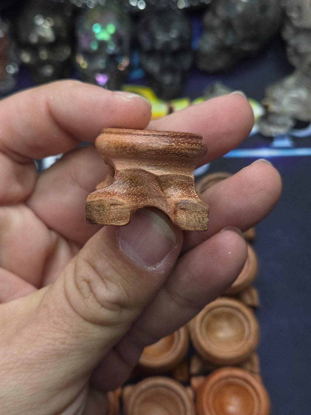 Small carved wood sphere holder