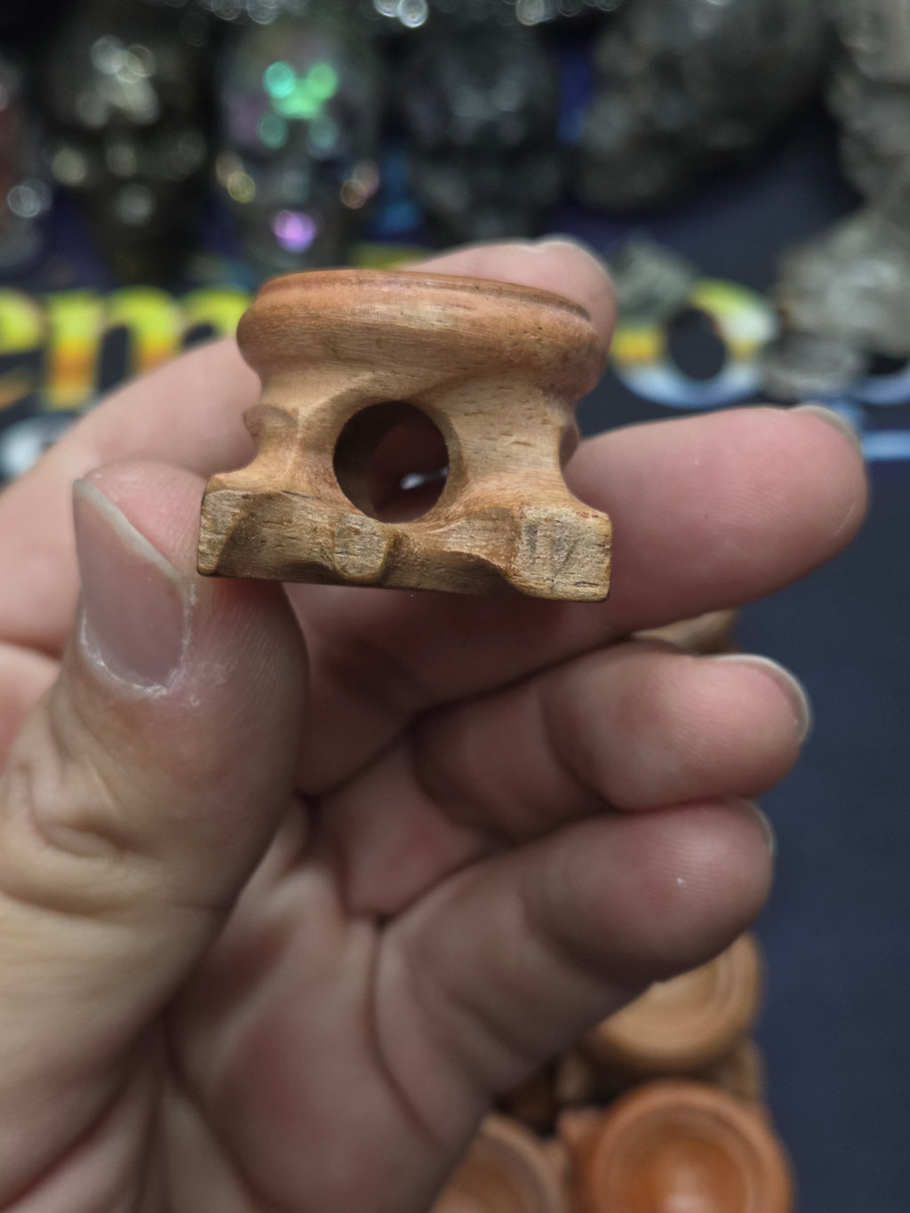 Small carved wood sphere holder