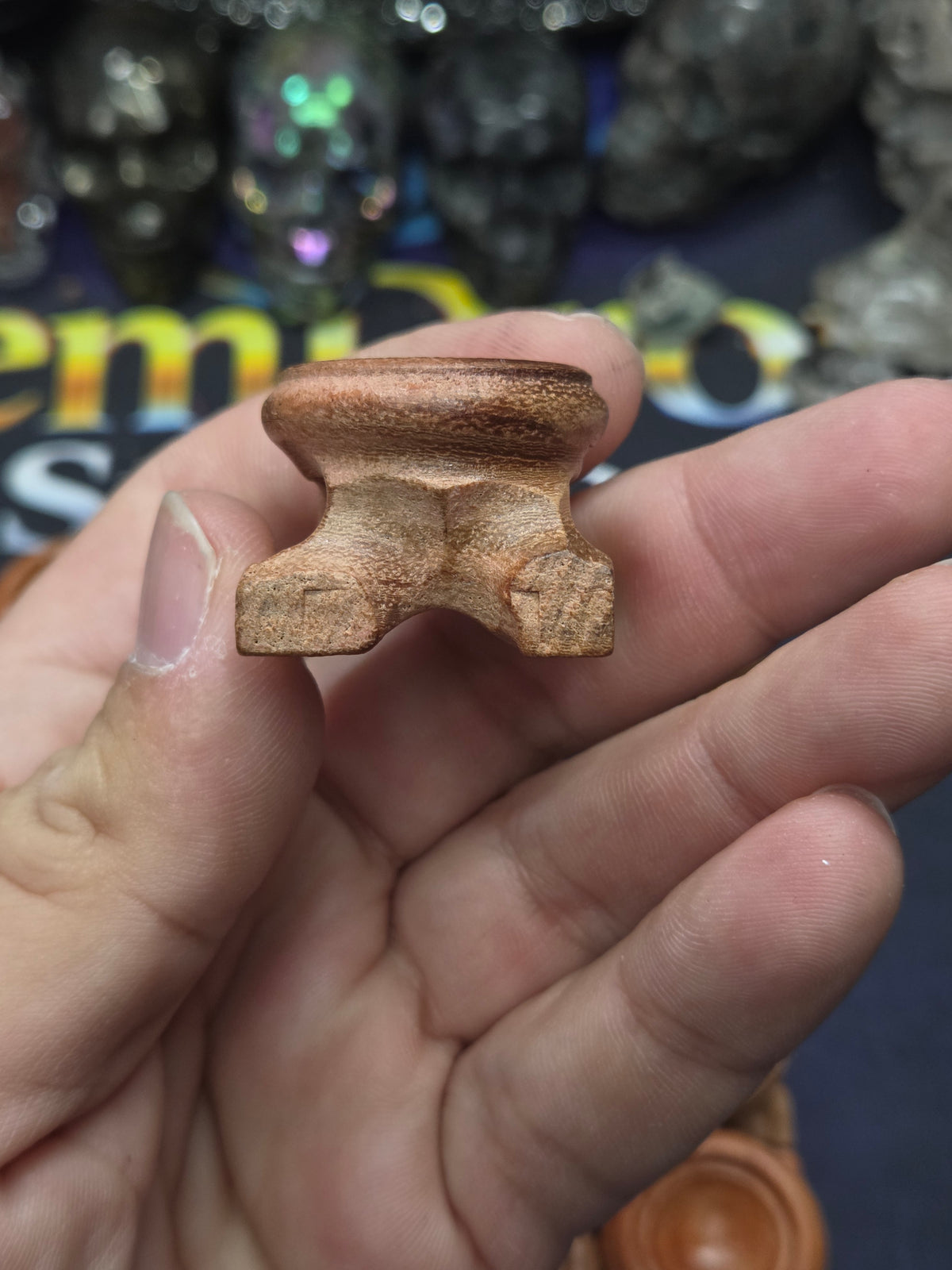 Small carved wood sphere holder