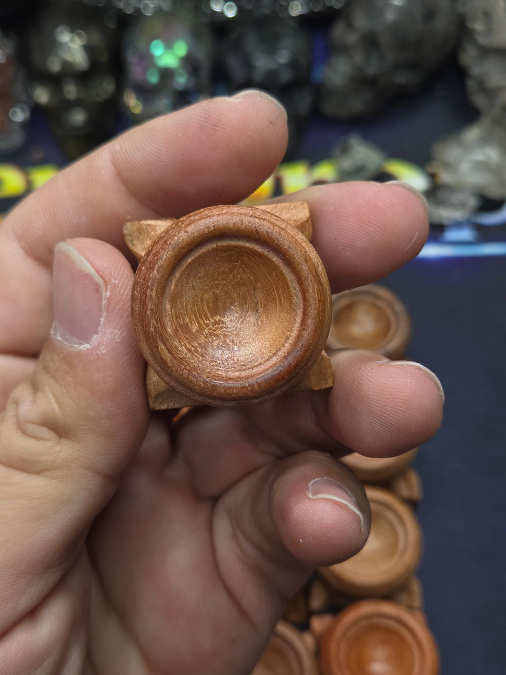 Small carved wood sphere holder