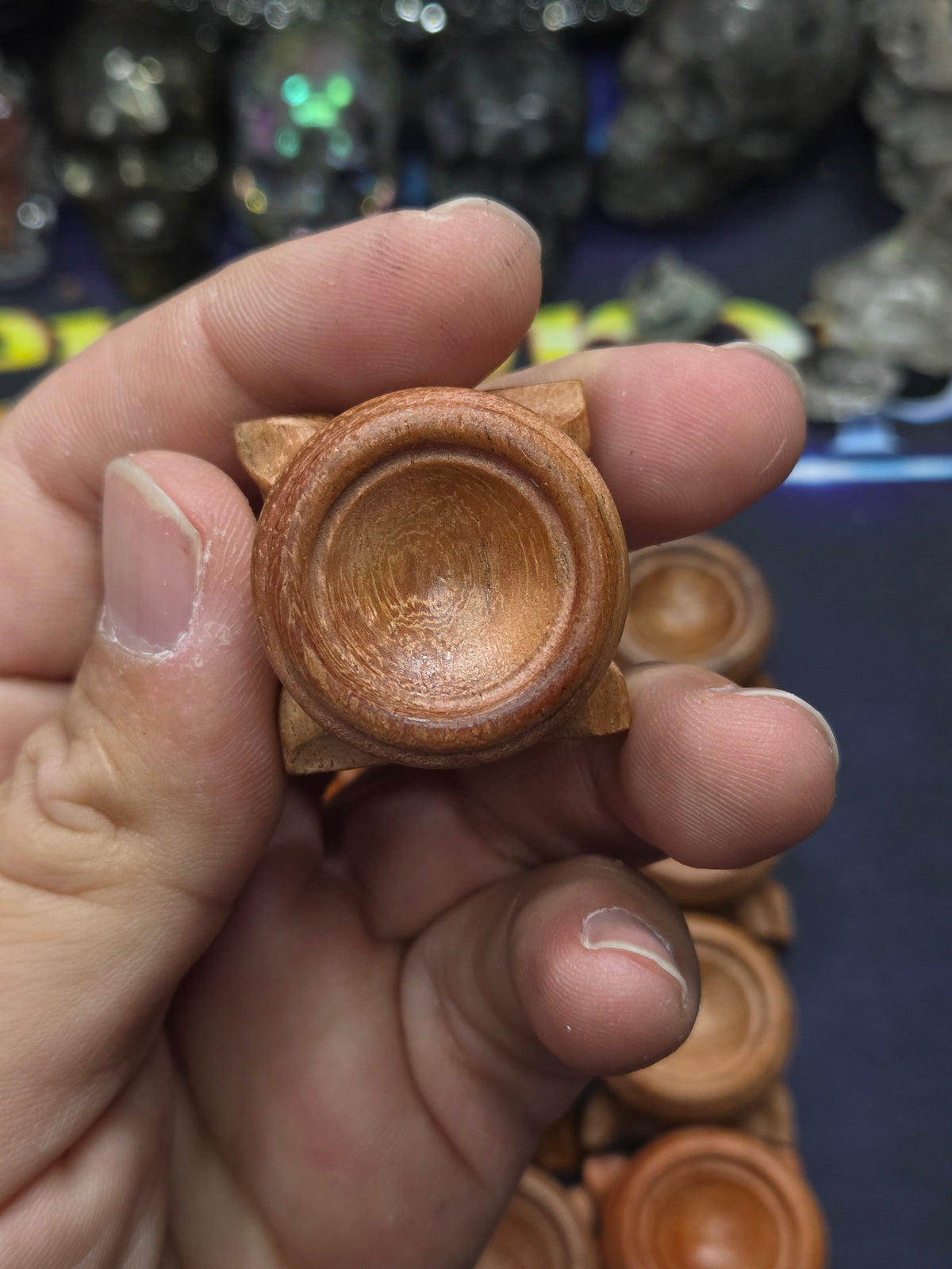Small carved wood sphere holder